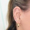Piercing uñas dorado