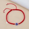 Pulsera Nico corona ojo azul