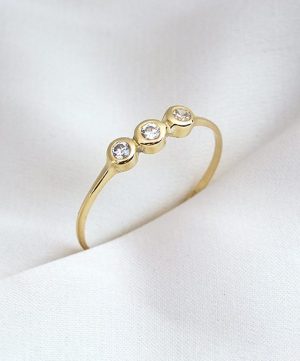 Anillo triple punto de luz oro