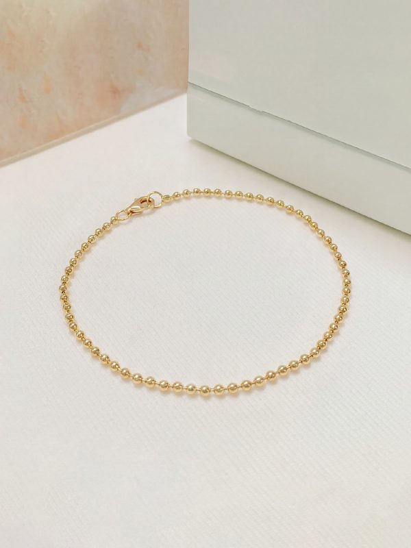 Pulsera puntos oro