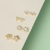 Aretes estrella cristal dorado