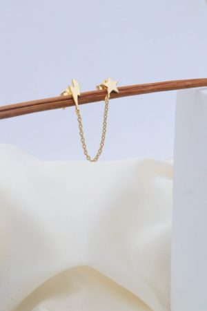 Piercing estrella y rayito cadena