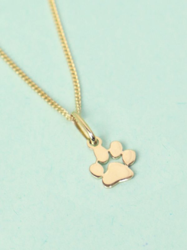 Dije patitas oro