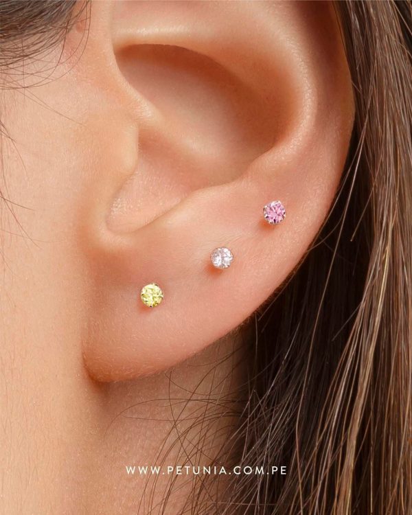 Piercing chispa rosa