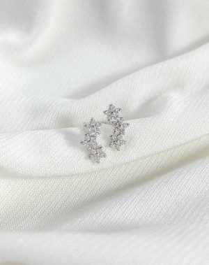 Aretes trio de flores blanco