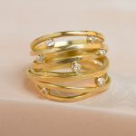 Anillo tejido diamantes