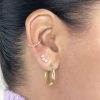 Piercing trio de flores opalo blanco