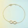 Pulsera Infinito cristal dorado