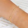 Pulsera disco oro