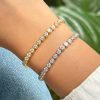 Pulsera Tennis Bezel Moissanita 3 mm dorado